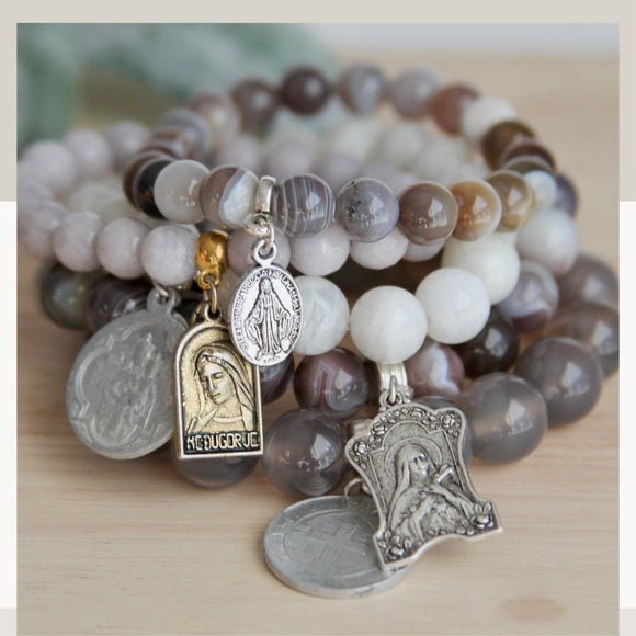 Catholic Patron saint pendant and medals on natural stone bracelets. Beautiful catholic gifts and christian keepsakes.