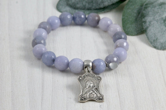 A Catholic bracelet of Saint Theresa of Liseaux and blue lace agate